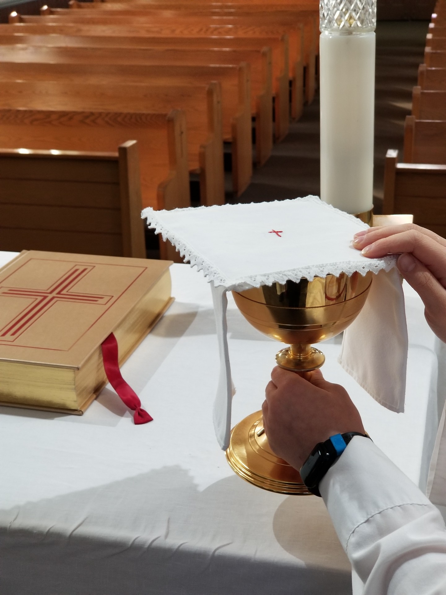 Altar Server bringing chalice