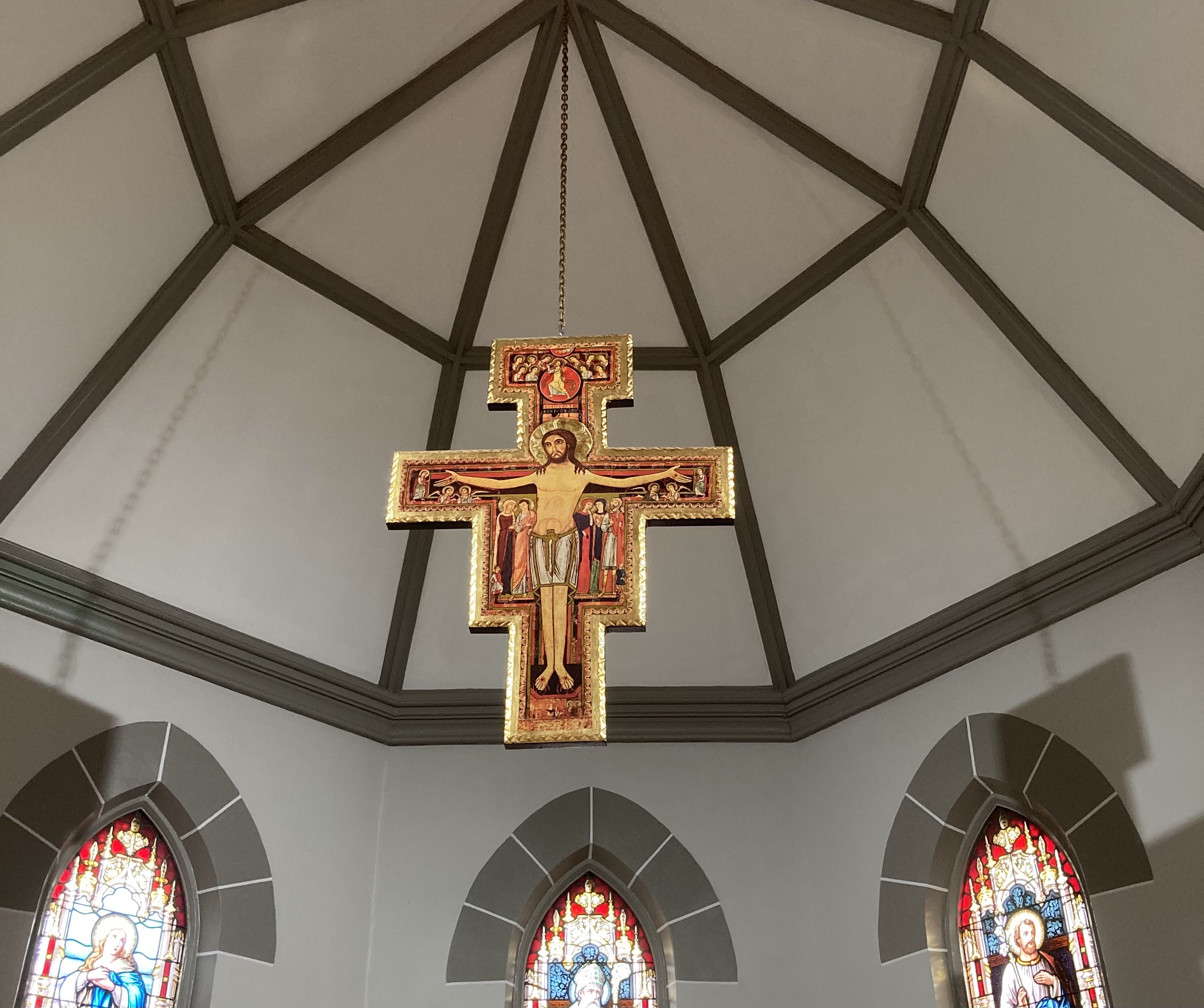 Hanging crucifix over sanctuary