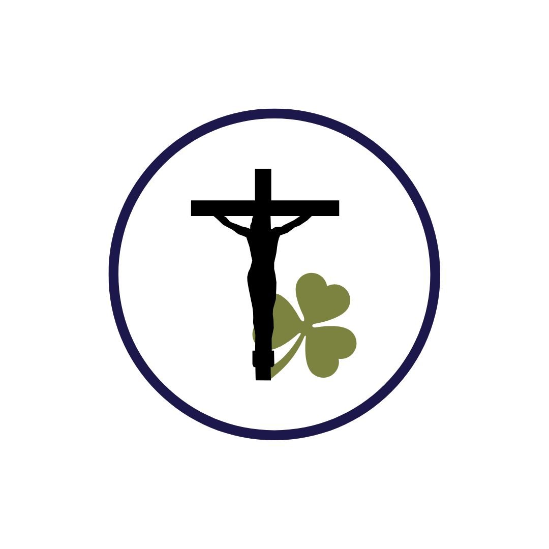 circle with a crucifix and shamrock in the centre
