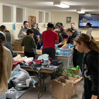 donations being sorted with youth group